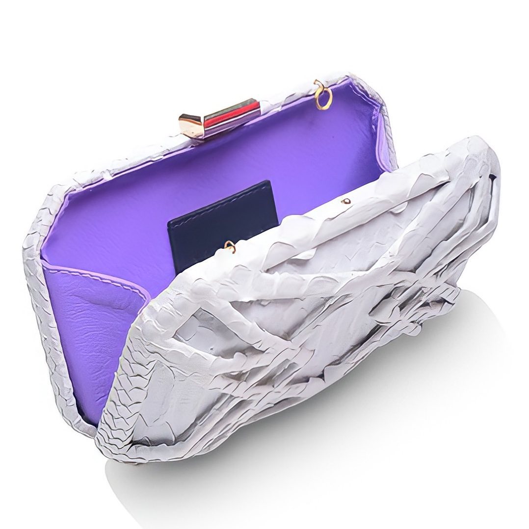 white exiterior and purple interior leather (scale pattern) purse with metal button